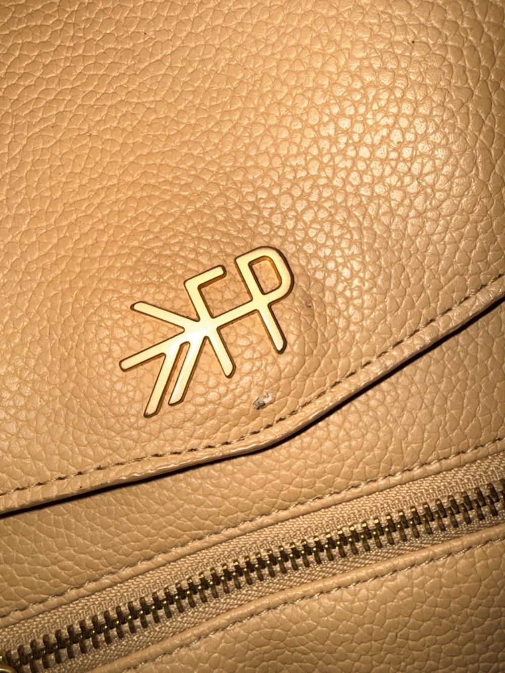 Freshly picked tan mini diaper bag